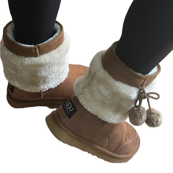 UGG Shoes - UGG POM-POM BOOTS The cutest UGG Boots with Pom-Poms.  Size 7.  Like new.